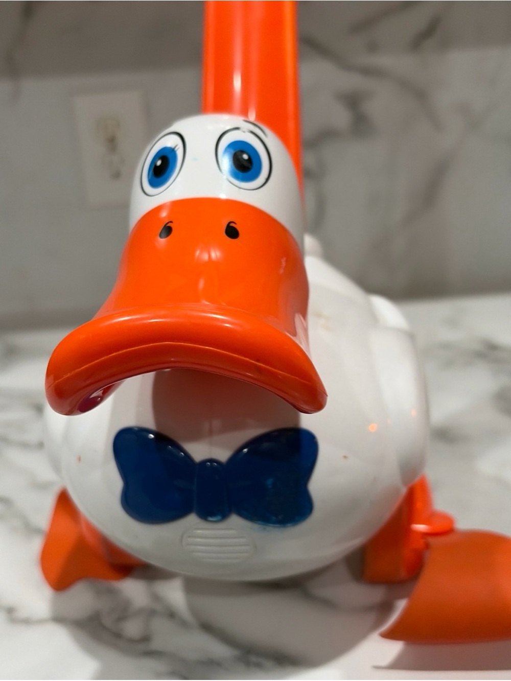 Bright White & Orange Duck Toy with Blue Bow Accent